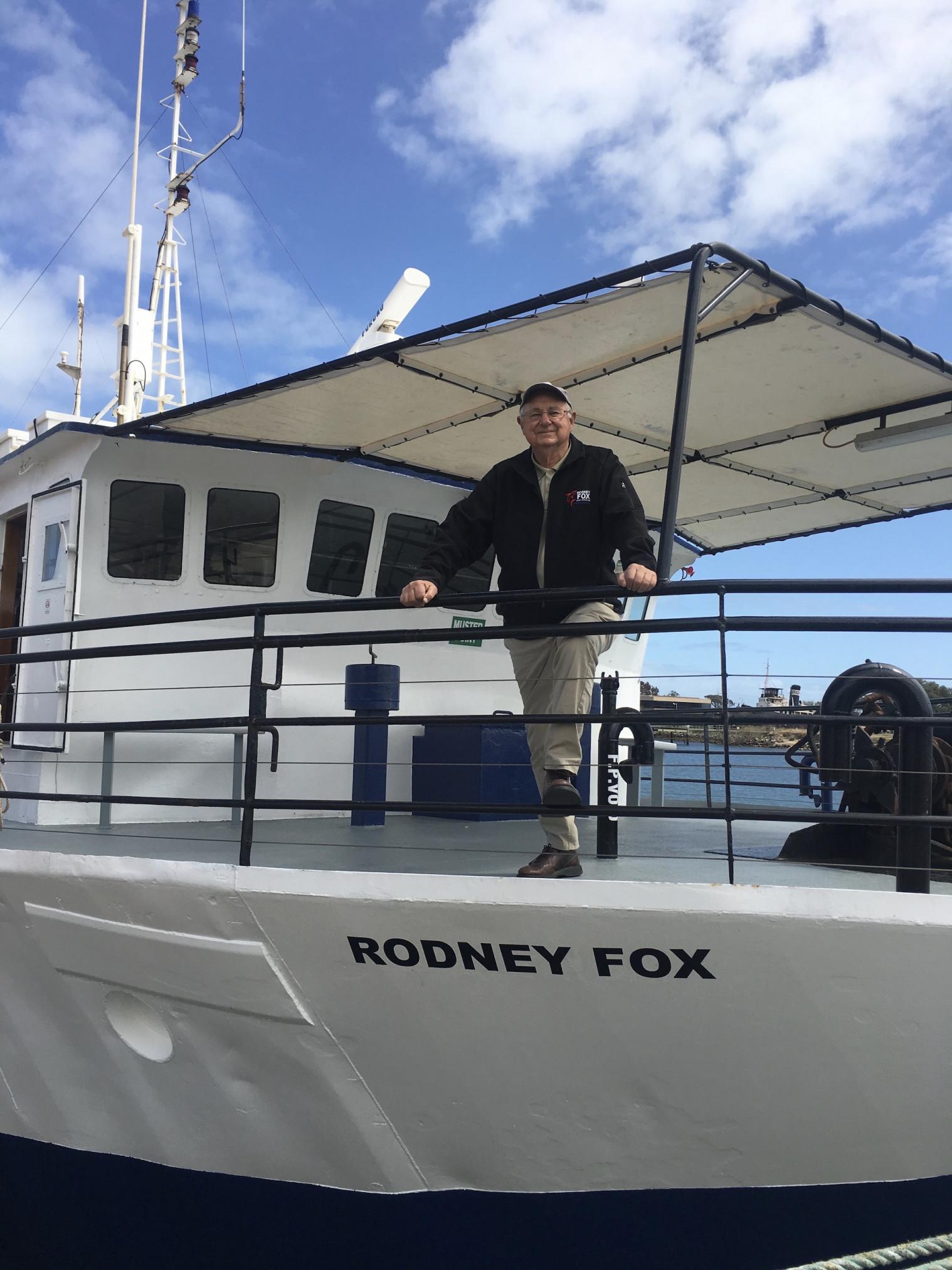 Rodney Fox standing on his Boat