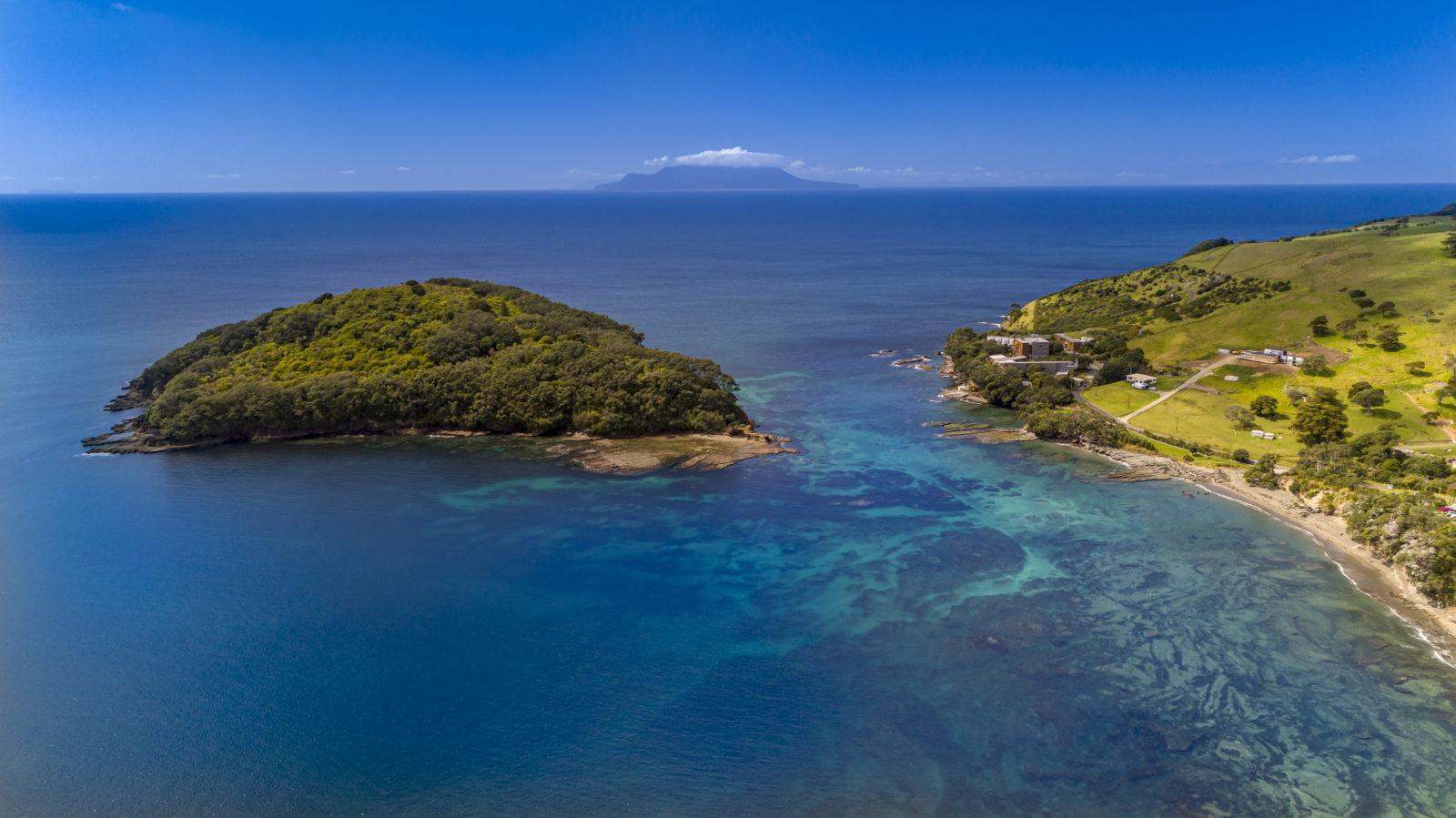 A Photograph of Goat Island with Little Barrier Island in the Distance