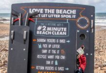 Beach cleaning station made out of marine rubbish