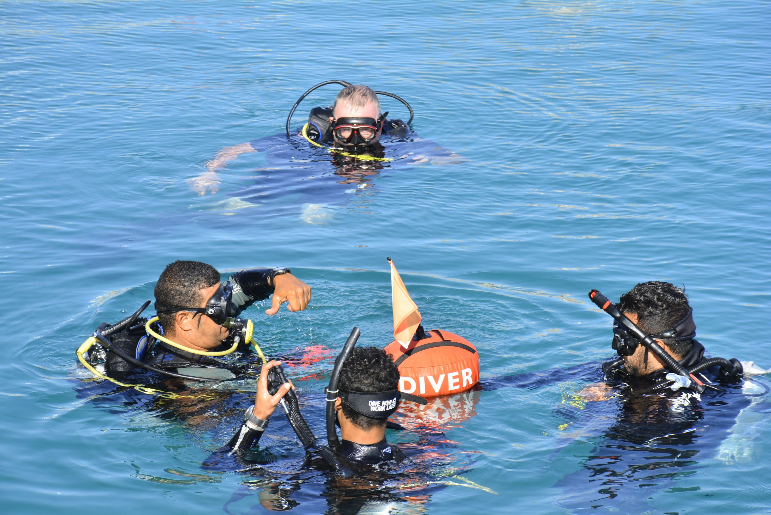 Ahmed Abd El Hakam delivering one of his planned open water lessons to Mahmoud Ibrahim and Moustafa El Shamy during a BSAC Instructor Crossover Course. Adrian Collier, BSAC National Instructor, observes