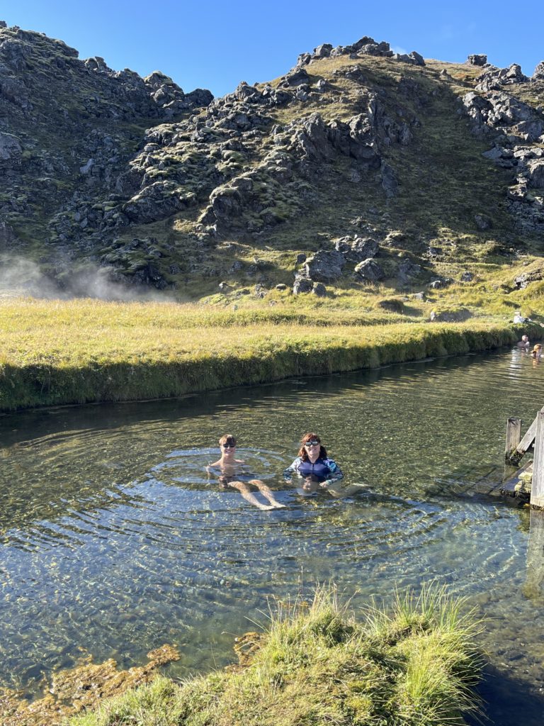 A refreshing dip in a thermal hot river