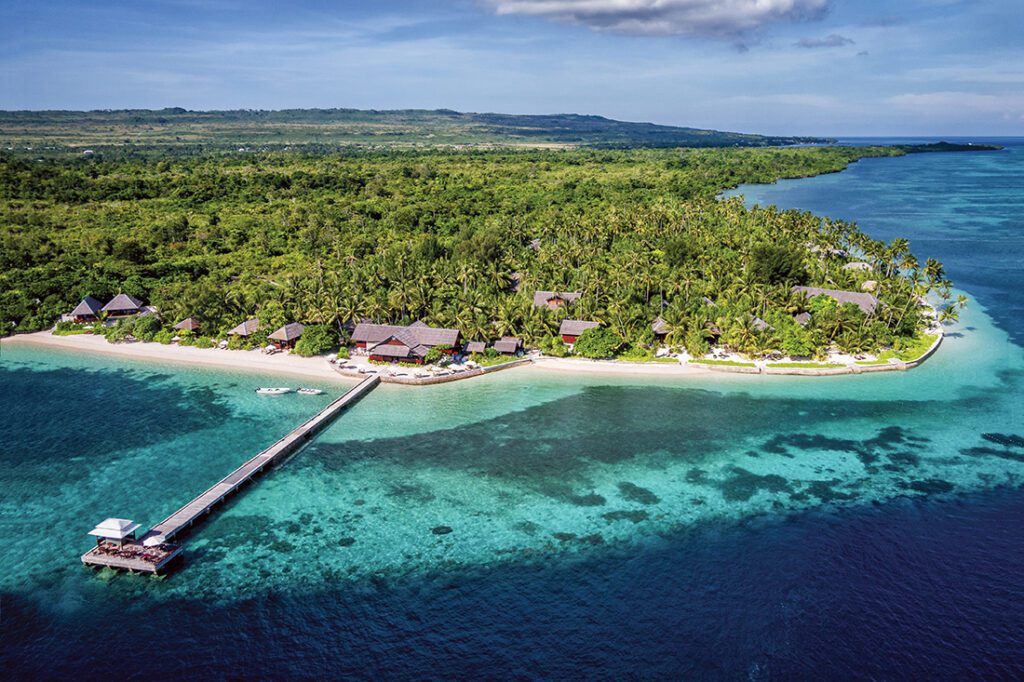 Aerial view of Wakatobi Dive Resort and its famous House Reef right at its door.