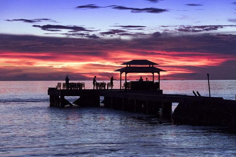 Wakatobi Dive Resort's jetty bar during sunset.