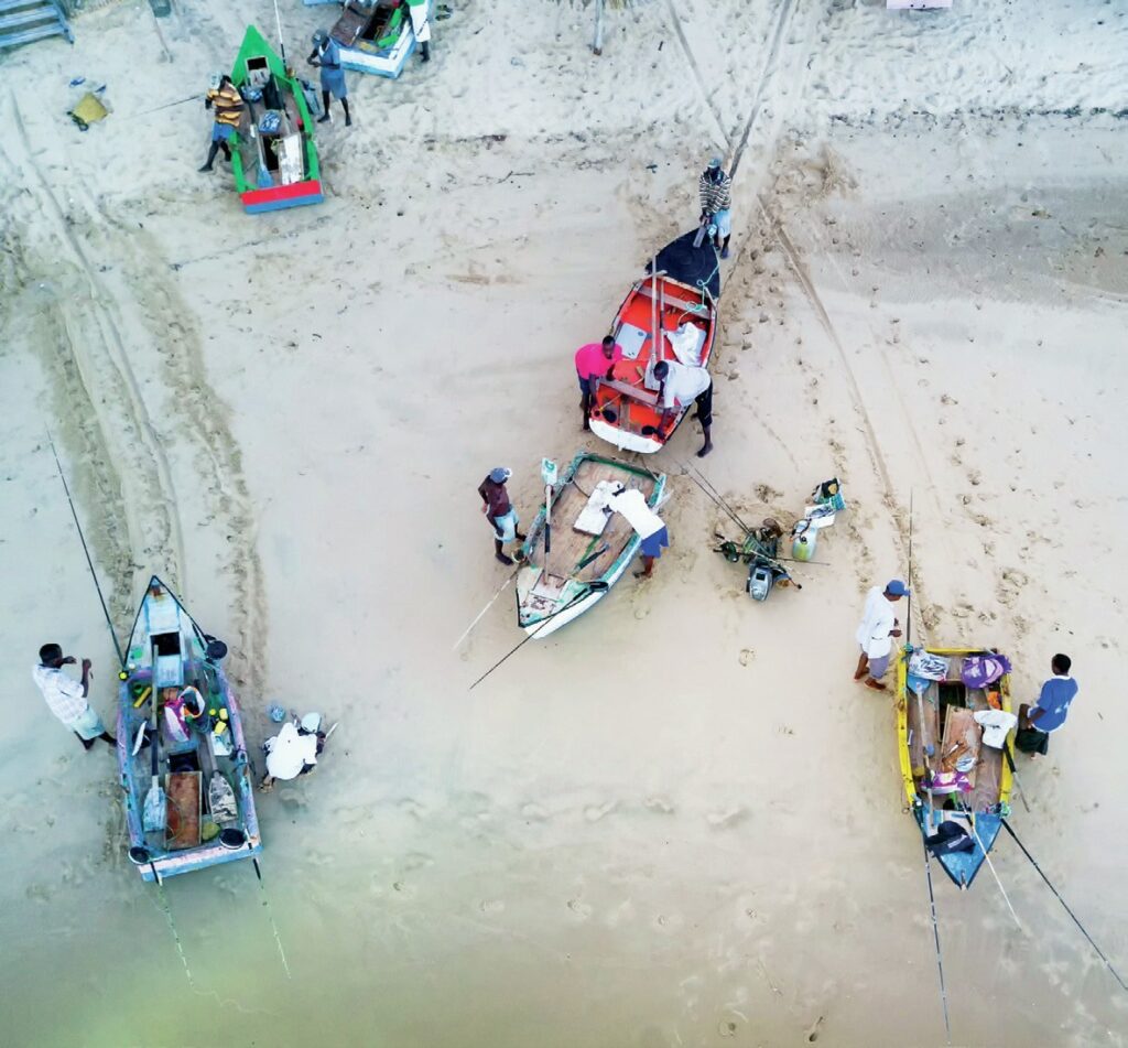 Aerial shot of boats on beach