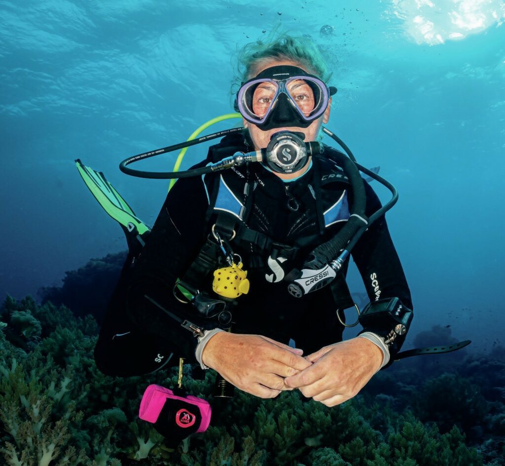 Happy diver on Tubbataha’s reefs
