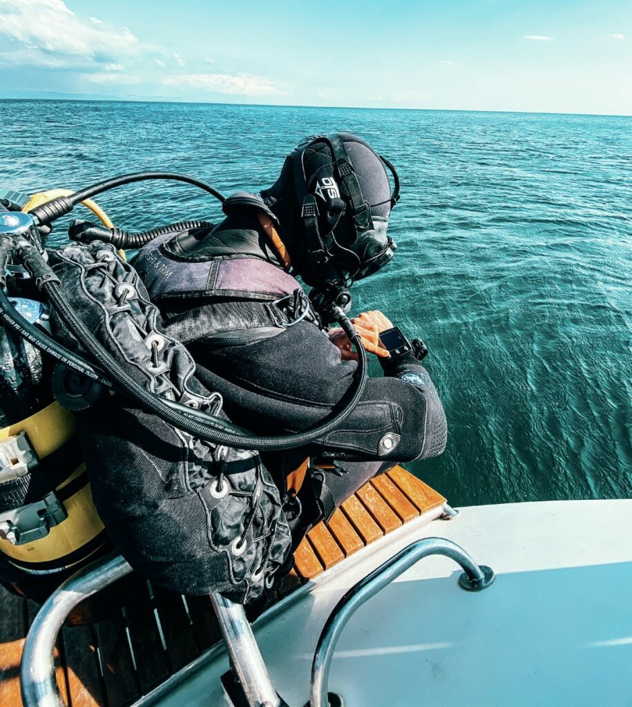 Scuba diver on boat right before diving