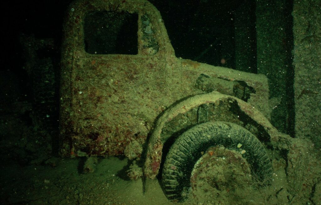 Trucks underwater in sea wreck