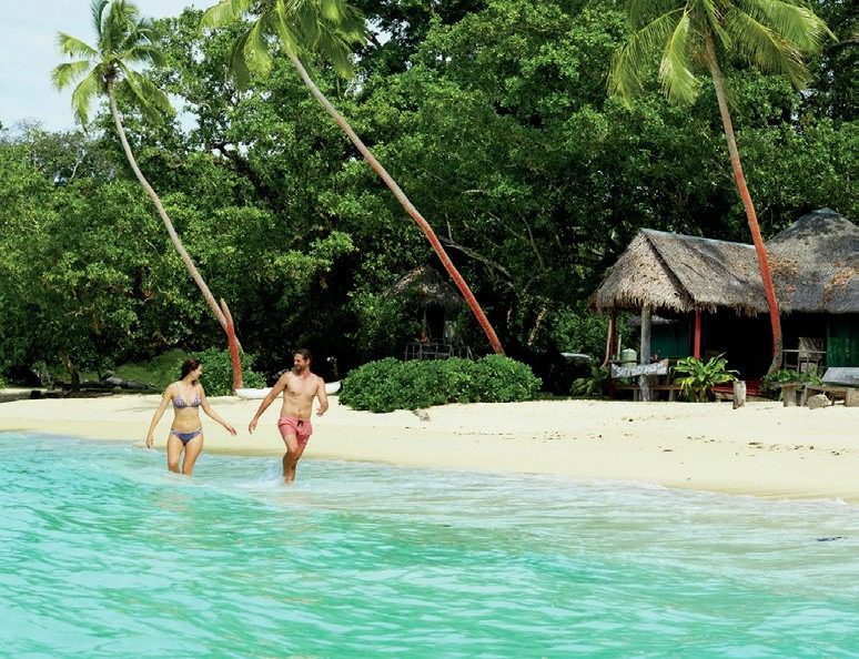 Two people on beach in Vanuatu